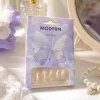 Purple nail art set, nude fake nails, glitter butterfly, silver rhinestone decoration details Picture